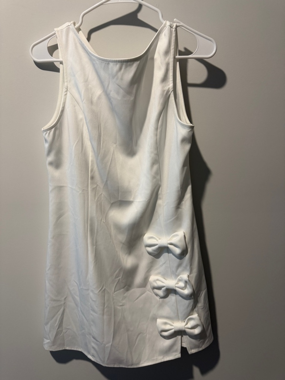 Cider White Sleeveless Mini Dress with Side Bow Accents